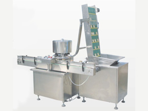 Укупорщик Пластиковых и Стеклянных Бутылок Завинчивающимися Крышками 